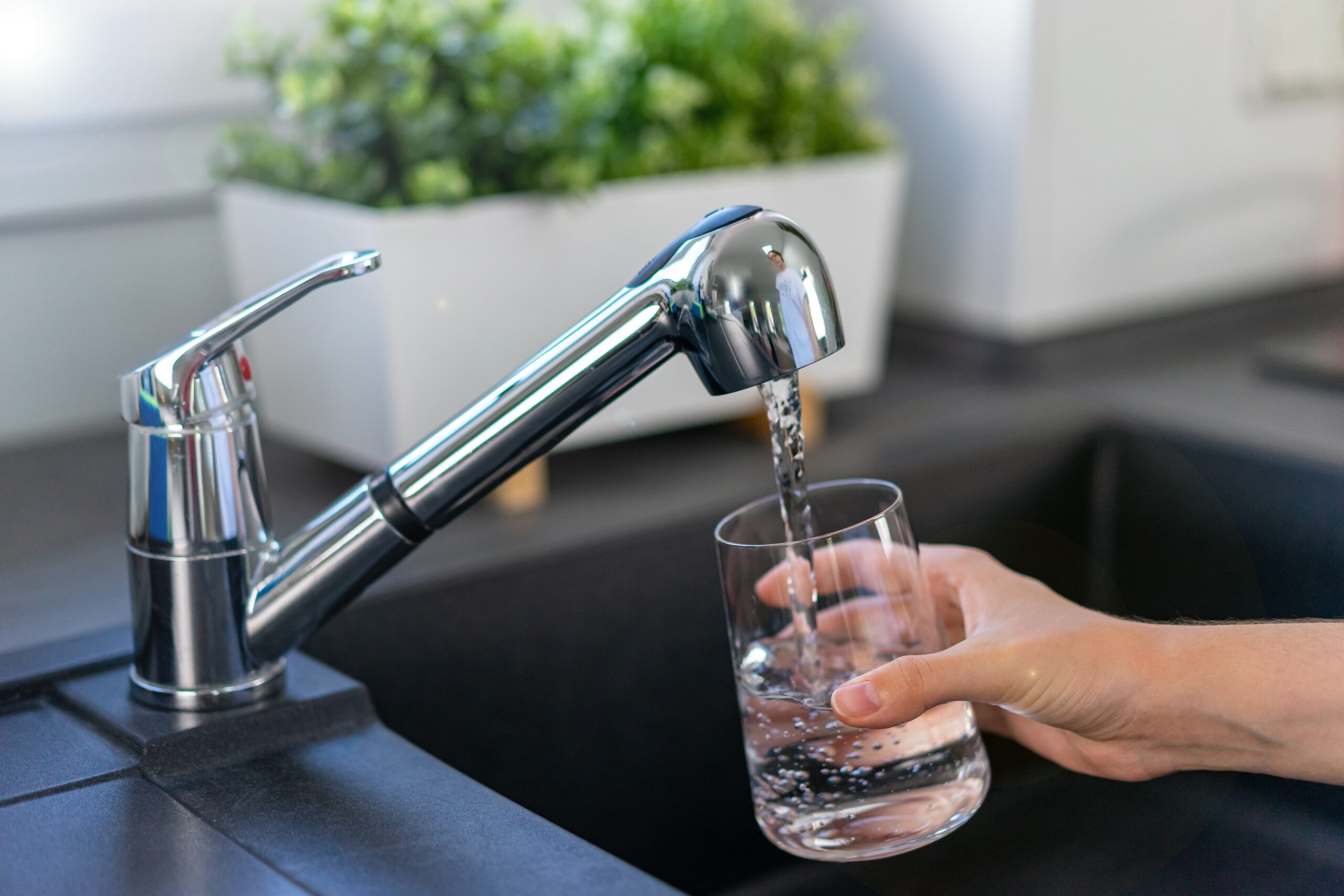 Filling,A,Glass,With,Drinking,Water,From,The,Kitchen,Tap.