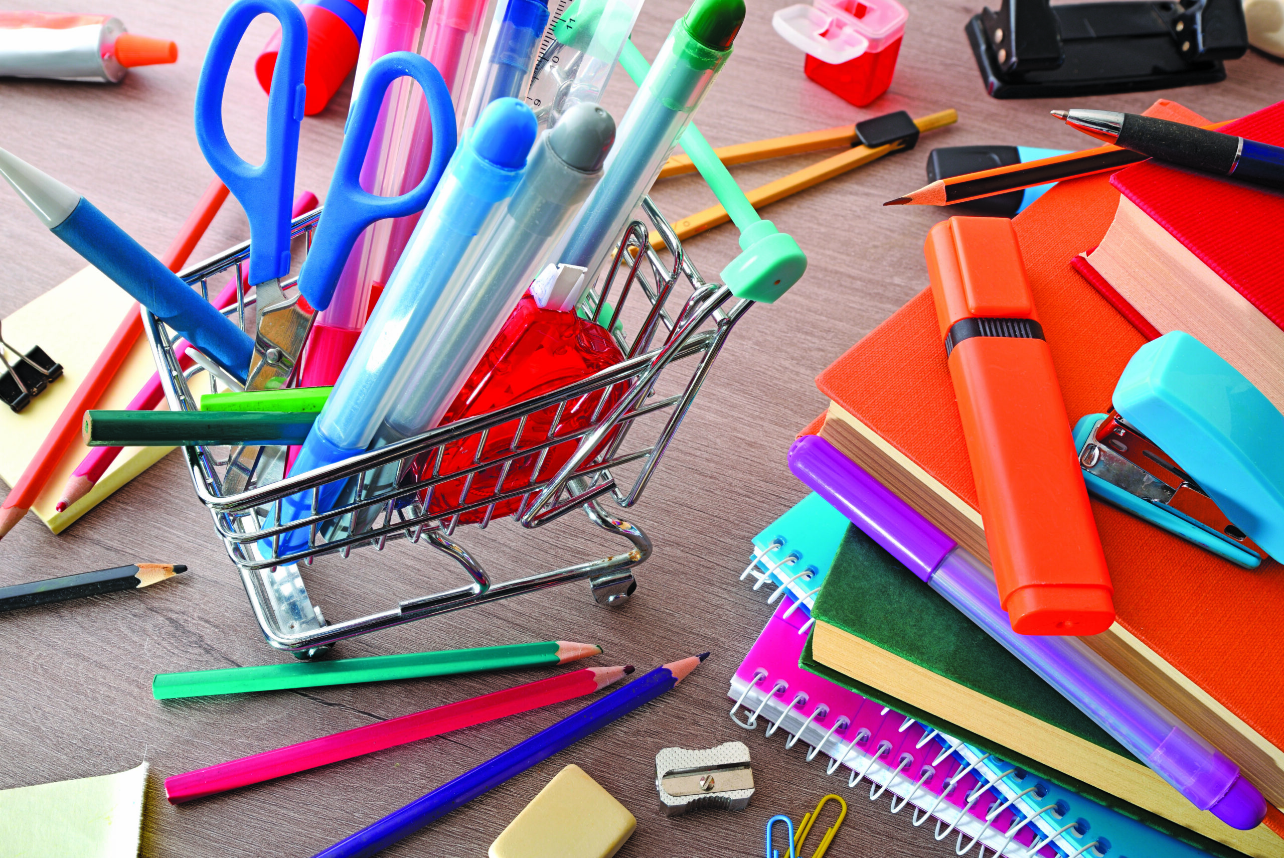 School,Supplies,Shopping,Concept,With,A,Mini,Shopping,Cart,Filled
